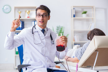 Patient getting blood transfusion in hospital clinic