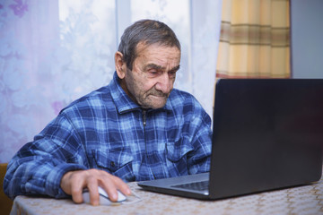 elderly people learn modern gadgets, computer and smartphone