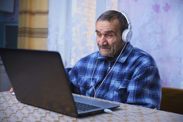elderly people learn modern gadgets, computer and smartphone