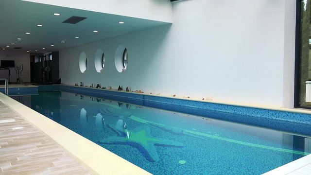 A swimming pool in a luxurious house