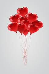 Fototapeta na wymiar Flying Red balloons in shape of heart on grey background.