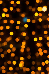 Yellow bokeh lights on dark background