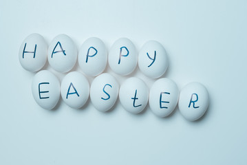 Eggs with the inscription of a happy Easter