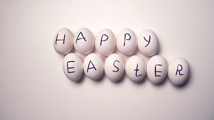 Eggs with the inscription of a happy Easter