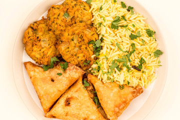 Onion Bhajis And Samosas With Pilau Rice