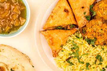 Onion Bhajis And Samosas With Pilau Rice