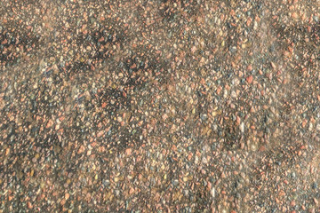 texture of asphalt covered with water, background