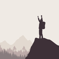 A tourist with a backpack standing on top of a rock rejoicing in win