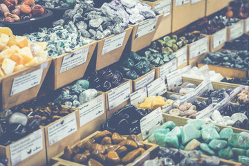 Market stall with tropical fruits and vegetables.