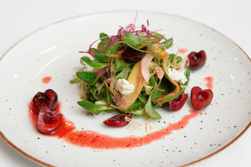 Small appetizer with berry dressing