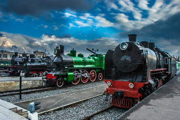 Black locomotives. Retro train. Three black locomotives. Railway.