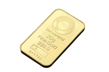 Minted gold bar weighing 50 grams isolated on white..Selective focus.