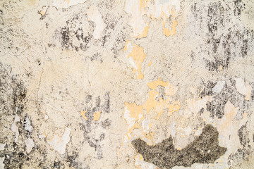 vieux mur de ciment gris-jaune
