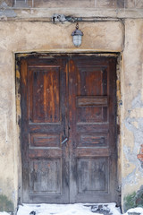 beautiful old wooden door with a visor