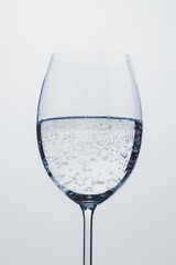 poured mineral water in wine glass