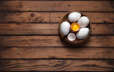 Easter background, eggs on wooden background,