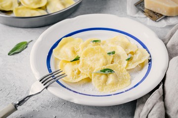 ravioli pasta with parmesan cheese and sage