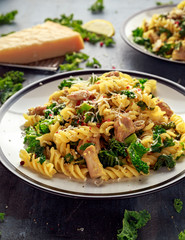 Homemade Pasta fusilli with Chicken, Green Kale, Garlic, lemon and parmesan cheese. healthy home food