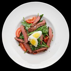 Roast beef appetizer isolated on black