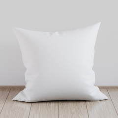 Blank white soft square pillow on a wooden floor near the wall, 3D render