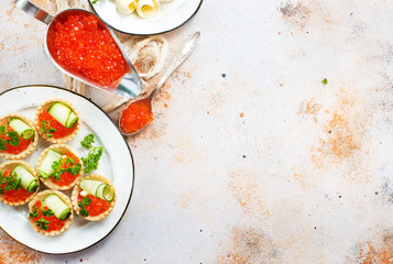 tartalets with red caviar