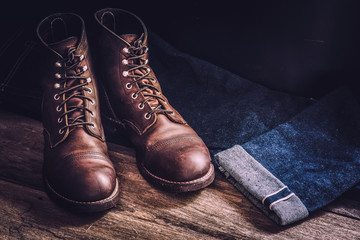 men's leather shoes and jeans