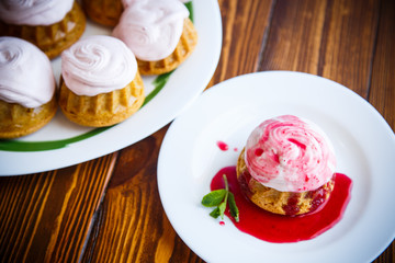 sweet muffins with berry cream