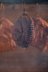 Smoked pork in a homemade smokehouse