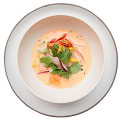 Sea bass ceviche shot from above, isolated on white