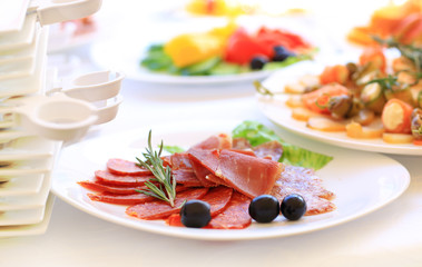 catering table set service with silverware and glass