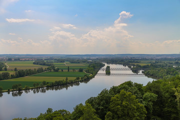 Panoramic view over a wide river in summer