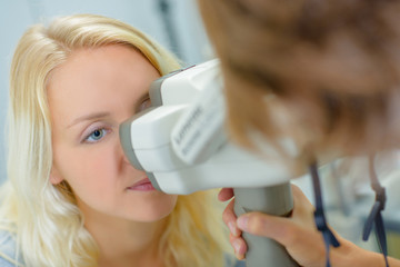patient in ophthalmology clinic during the study of vision defects