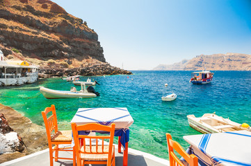 Cafe on the sea coast, Santorini island, Greece.