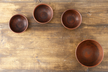 Obraz na płótnie Canvas Ceramic ware on a wooden surface