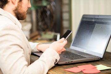 Busy business person working on laptop 