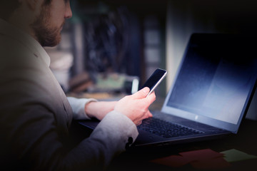 Busy businessman works late in the office