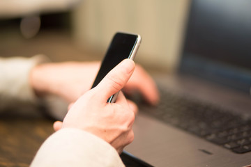 Busy business person checking phone