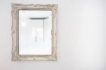 Modern White vintage frame mirror on white wall antique design