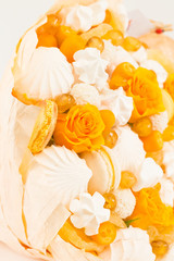 Fototapeta na wymiar Flowers, fruit bouquet, white isolated, yellow rose, marshmallows, macaroons