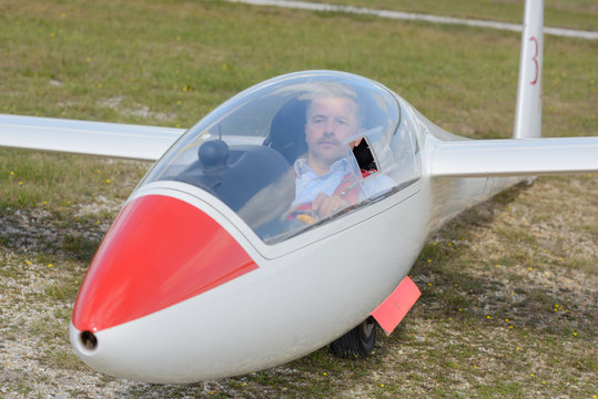 Man in stationary sailplane