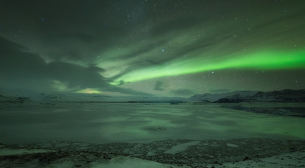 Aurora borealis over Jokulsarlon lagoon in Iceland