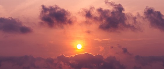 Panorama picture of the sun on the sky and cumulus cloud at twilight time