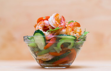 Food. Langoustines salad, beige background