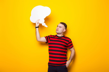 Handsome man in bright T-shirt with speech bubble