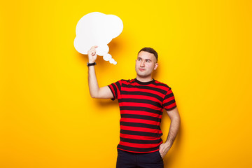 Handsome man in bright T-shirt with speech bubble