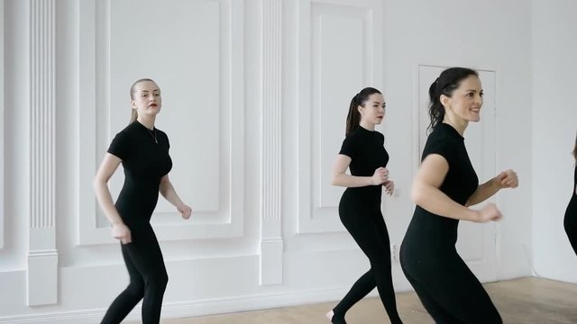 group of girls are engaged in taibo. healthy and sport lifestyle concept