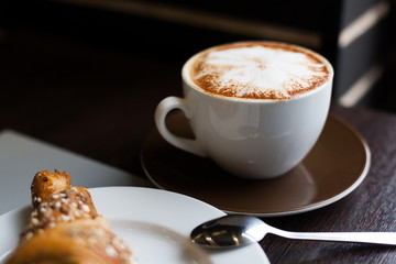 Food. Cappuccino and croissant