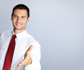 Businessman giving hand for handshake