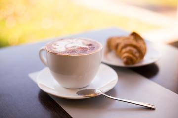 Food. Cappuccino and croissant