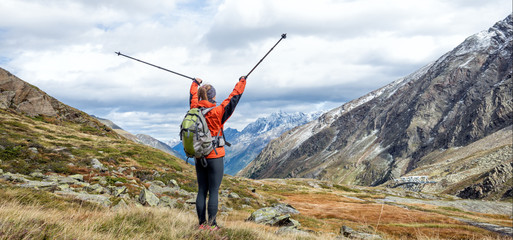 Young woman hiking in the mountains